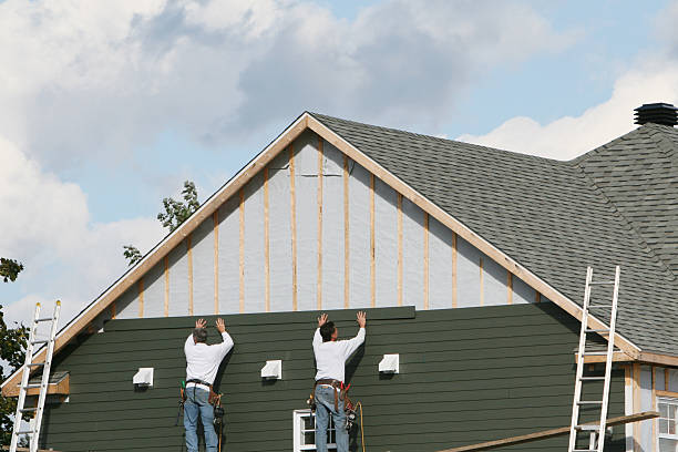 Professional Siding Replacement technician working in Winchester, MA